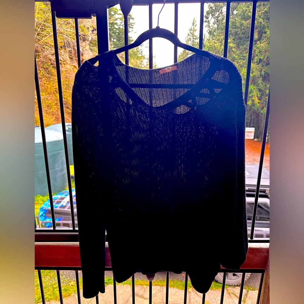 Cute black sweater.